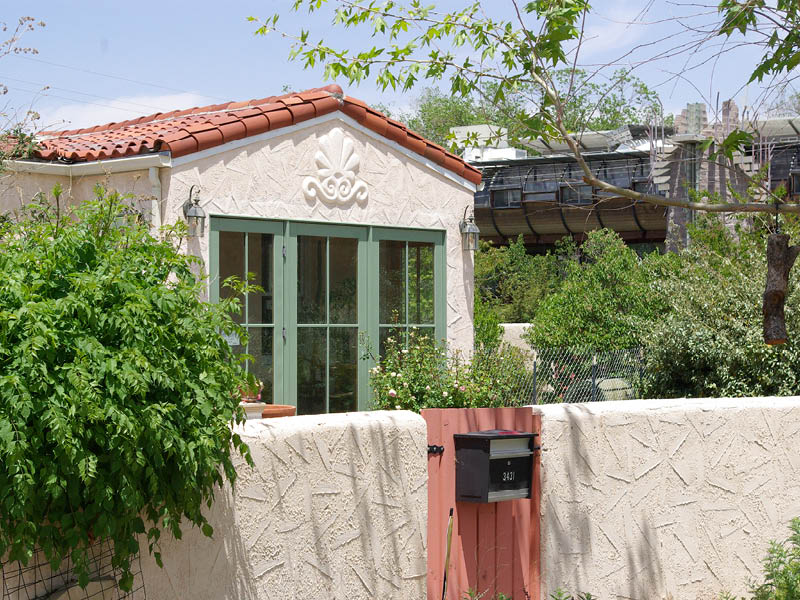 Stucco with heavy texture on a home and courtyard wall