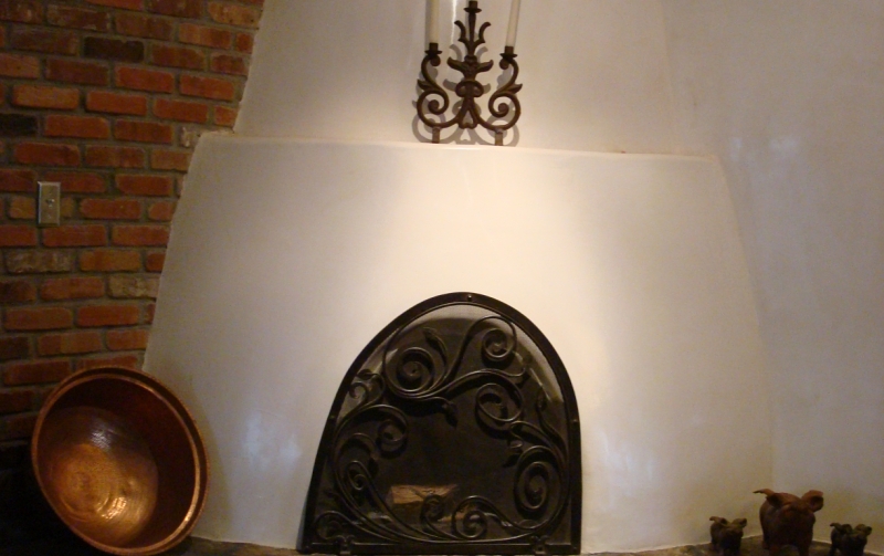 Redtop interior plaster on a traditional spanish-style fireplace